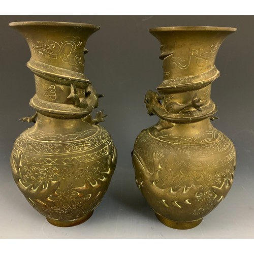 163 - PAIR  OF BRASS  ORIENTAL VASES WITH EMBOSSED DRAGON DECORATION  WITH 4 CHARACTER MARKS  26cm TALL