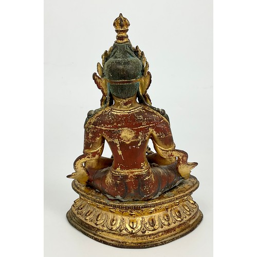 164 - SINO TIBETAN FIGURE DEPICTING A SEATED BUDDHA, SET WITH TURQUOISE AND OTHER STONES AND HAVING REMNAN... 