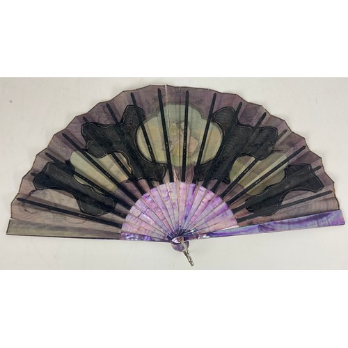 148 - PAPER AND LACE FAN WITH PURPLE TINTED MOTHER OF PEARL STICKS