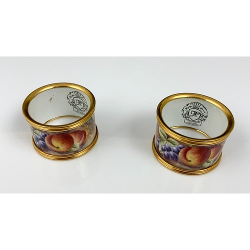 41 - KINGSLEY ENAMELS POT WITH COVER PAINTED STILL LIFE FRUIT AND TWO SERVIETTE RINGS