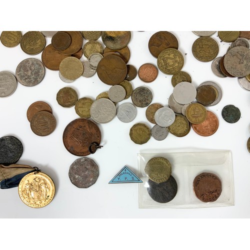 185 - QUANTITY OF MISCELLANEOUS COINS & TOKEN ,BADGES IN A TEACADDY