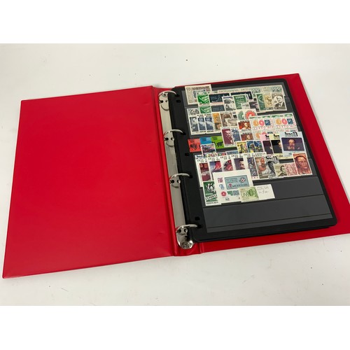 465 - RED PADDED STOCKBOOK WITH UM/M/U COLLECTORS DUPLICATES. INTEREST IN SOUTH AMERICA (M) CUT £250+ AND ... 