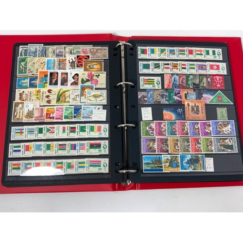 465 - RED PADDED STOCKBOOK WITH UM/M/U COLLECTORS DUPLICATES. INTEREST IN SOUTH AMERICA (M) CUT £250+ AND ... 