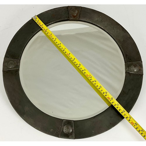 91 - INTERESTING ARTS & CRAFTS CIRCULAR BEVELLED MIRROR WITH HAMMERED METAL ON WOOD FRAME. APPROX. DIA OF... 