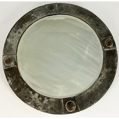 92 - INTERESTING ARTS & CRAFTS CIRCULAR BEVELLED MIRROR WITH HAMMERED METAL ON WOOD FRAME. APPROX. DIA OF... 