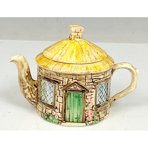 253 - COLLECTION OF NOVELTY TEAPOTS, MOSTLY WADE PLUS 2 OTHERS