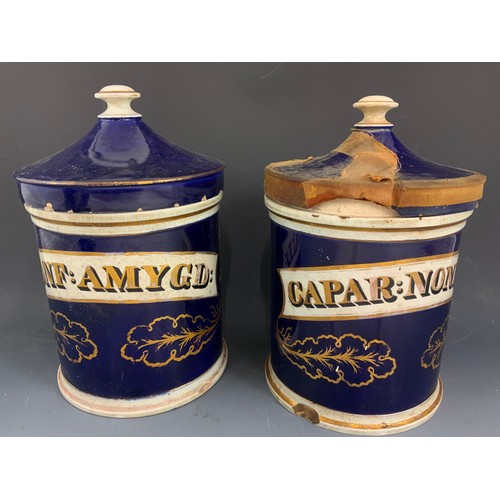 269 - 4 LARGE DRUG / CHEMIST JARS  WITH COVERS COBALT BLUE WITH GILT  DECORATION 30cm TALL  AF ADVISED FRO... 