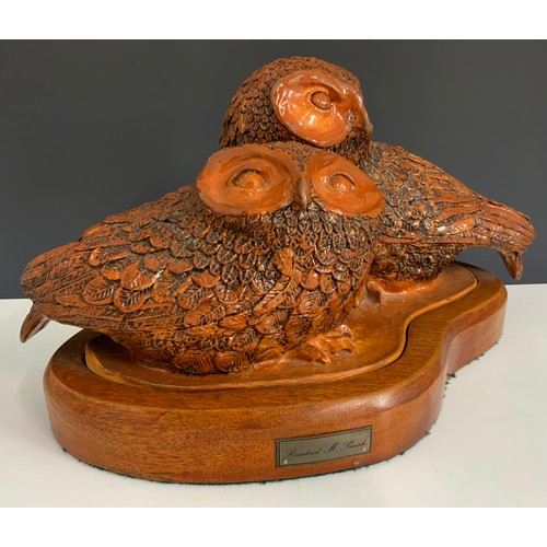 295 - WELL MODELLED POTTERY OWL STUDY ON WOODEN PLINTH  22cm TALL