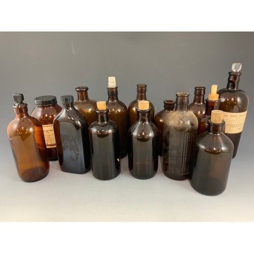 334 - LARGE QUANTITY OF ANTIQUE/ VINTAGE BROWN GLASS CHEMIST BOTTLES/ JARS ADVISED FROM MANDERS OF MALVERN... 