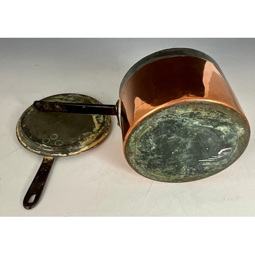 THREE ANTIQUE COPPER AND BRASS SAUCEPANS WITH SKILLET LIDS