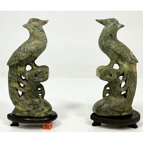 470 - PAIR OF CARVED JADE BIRDS AF ON WOOD BASES. HEIGHT OF BASE 2cm, HEIGHT OF EACH BIRD APPROX. 18cm