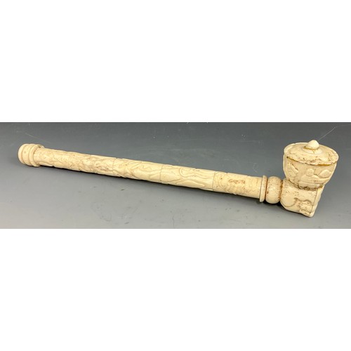 471 - CARVED BONE OPIUM PIPE DECORATED WITH ORIENTAL FIGURES, APPROX. 37 cm