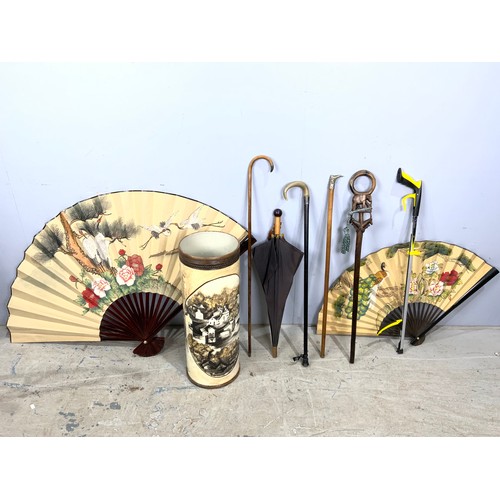 522 - MISC. WALKING STICKS AND PARASOL & 2 LARGE DECORATIVE FANS