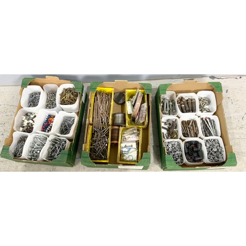 597 - 3 TRAYS OF IRONMONGERY SCREWS CABLE CUPS, NAIL FIXIN, COPPERWARE, RAWBOLTS, PLUBMING ETC