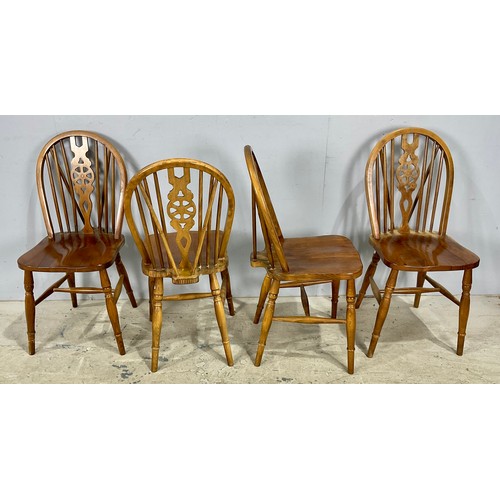 777 - FOUR MODERN WHEEL BACK DINING CHAIRS