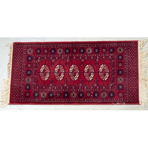 789 - TWO RED GROUND RUGS LARGEST 195cm x 140cm