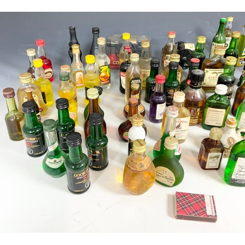 82 - LARGE QUANTITY OF MINIATURES INC BELLS, HAIG , BARDINET ETC