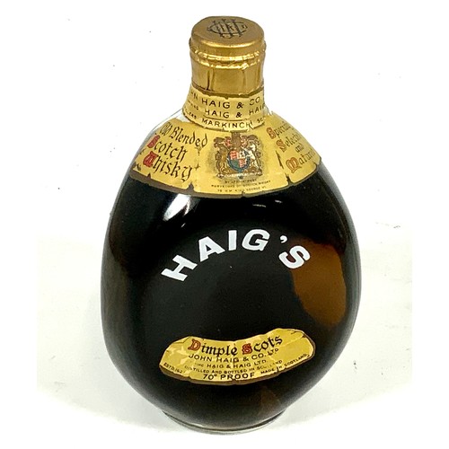 17 - BOTTLE OF HAIG DIMPLE WHISKY