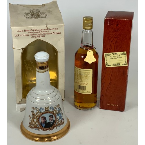 16 - BELLS WHISKY, ONE BOTTLE IN PRESENTATION BOX AND A PRINCE ANDREW AND SARAH FERGUSON COMMEMORATIVE BE... 