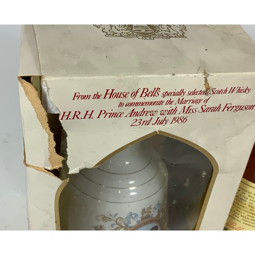 16 - BELLS WHISKY, ONE BOTTLE IN PRESENTATION BOX AND A PRINCE ANDREW AND SARAH FERGUSON COMMEMORATIVE BE... 