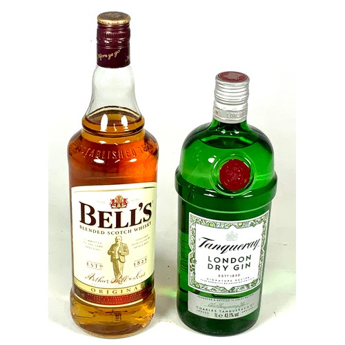 23 - 1 LITRE BOTTLES OF BELLS WHISKY AND TANQUERAY GIN