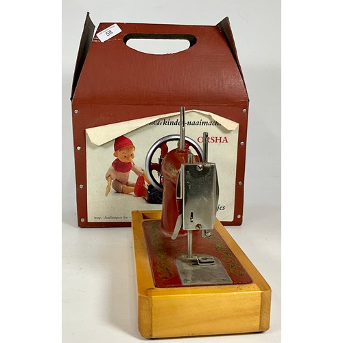 58 - CASED, MINIATURE CHILDS SEWING MACHINE, MARKED MADE IN USSR, ORSHA