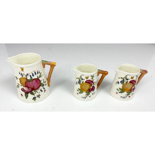 200 - ROYAL WORCESTER JUGS INC SET OF GRADUATED LEAF JUGS & 3 BARREL JUGS WITH FRUIT DECORATION