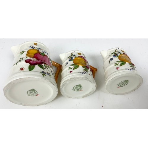 200 - ROYAL WORCESTER JUGS INC SET OF GRADUATED LEAF JUGS & 3 BARREL JUGS WITH FRUIT DECORATION