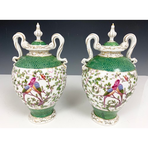 283 - PAIR OF CONTINENTAL VASES & COVERS WITH BIRD DECORATION 28cm TALL