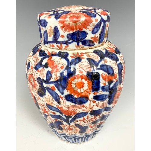 301 - FLUTED ORIENTAL GINGER JAR WITH COVER  17cm TALL TOGETHER WITH A SMALL DOUBLE GOURD VASE