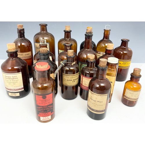 341 - LARGE QUANTITY OF ANTIQUE/ VINTAGE BROWN GLASS CHEMIST BOTTLES/ JARS ADVISED FROM MANDERS OF MALVERN... 