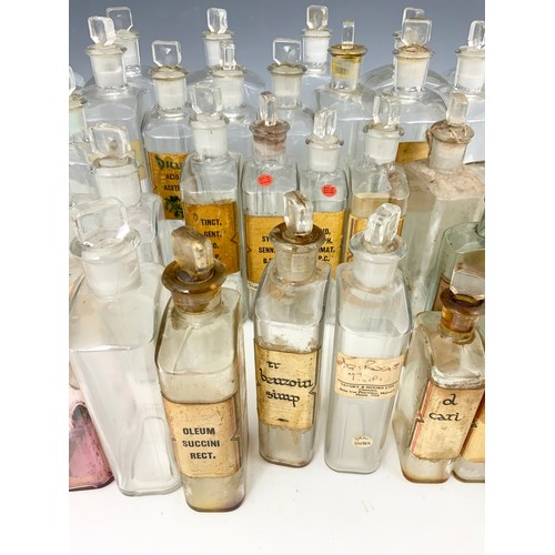 342 - LARGE QUANTITY OF ANTIQUE/ VINTAGE CLEAR GLASS CHEMIST BOTTLES/ JARS ADVISED FROM MANDERS OF MALVERN... 