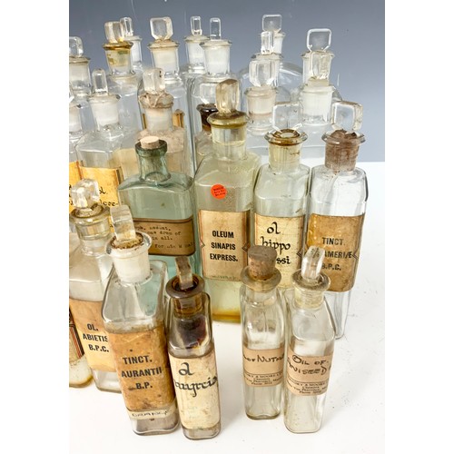 342 - LARGE QUANTITY OF ANTIQUE/ VINTAGE CLEAR GLASS CHEMIST BOTTLES/ JARS ADVISED FROM MANDERS OF MALVERN... 