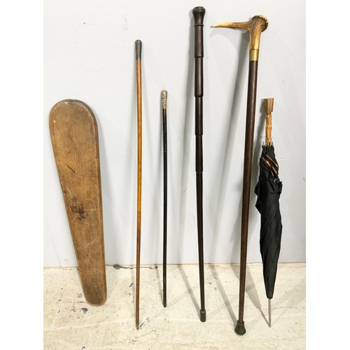 461 - 2 SWAGGER STICKS, 2 WALKING STICKS , VINTAGE UMBRELLA  &  A UNUSUAL  VINTAGE BOARD FOR TAILORING