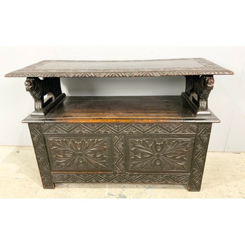 762 - CARVED OAK MONKS BENCH/ SETTLE WIDTH 107cm