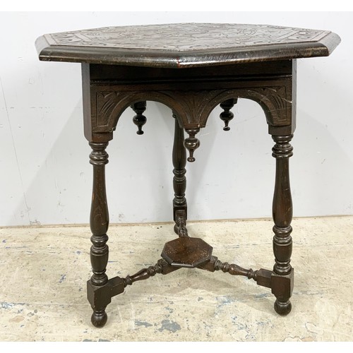 761 - OCTAGONAL CARVED TABLE WITH TURNED SUPPORTS, CROSS STRETCHERS AND UNDER TIER