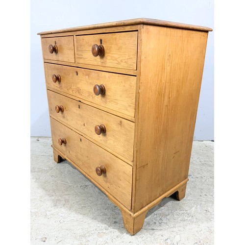 719 - VICTORIAN PINE CHEST OF TWO OVER THREE DRAWERS WITH TURNED HANDLES ON BRACKET FEET