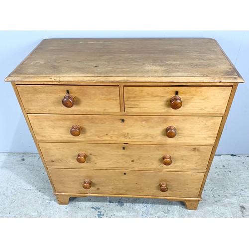 719 - VICTORIAN PINE CHEST OF TWO OVER THREE DRAWERS WITH TURNED HANDLES ON BRACKET FEET