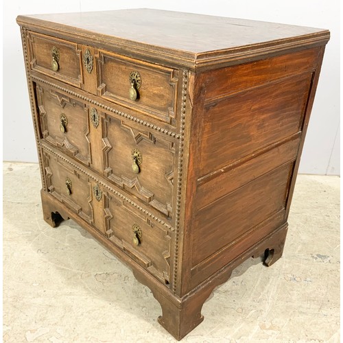 724 - OAK CHEST OF THREE LONG DRAWERS WITH GEOMETRIC MOULDINGS ON BRACKET FEET WIDTH 80cm