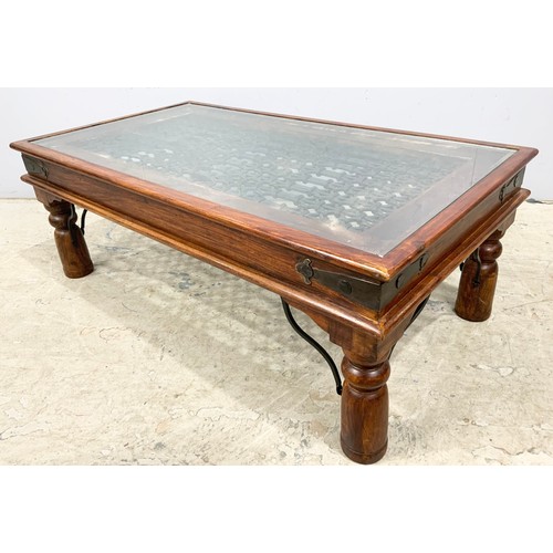 714 - COFFEE TABLE WITH CAST IRON BASE & GLASS TOP 110cm x 60cm