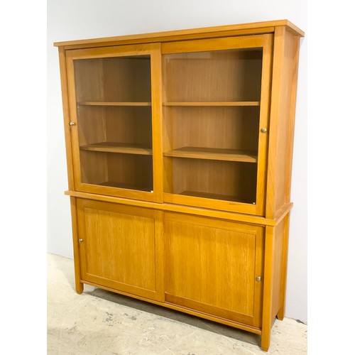 728 - LARGE GLASS FRONTED MODERN LIGHT OAK CABINET