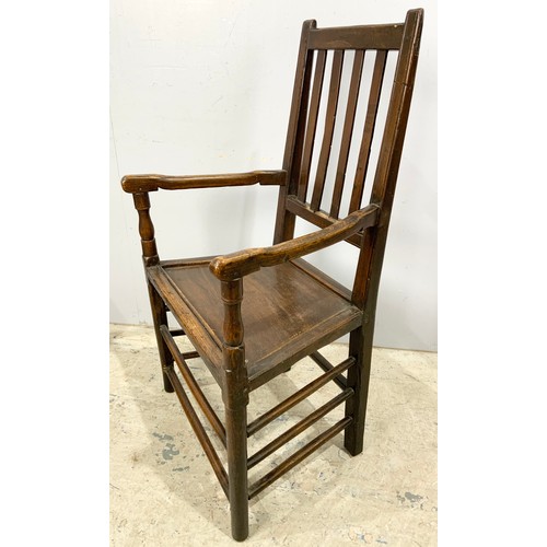 796 - ANTIQUE OAK ARM CHAIR  WITH BOARD SEAT