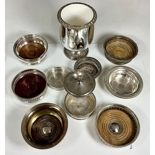 365 - MISC. PLATED BOTTLE COASTERS TOGETHER WITH AN ART DECO STYLE SILVER PLATED ICE BUCKET