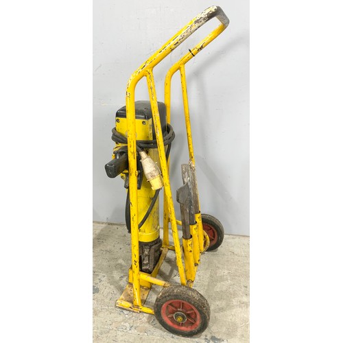 564 - BOSCH CONCRETE BREAKER ON TROLLEY WITH ACCESSORIES