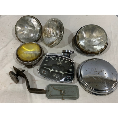 615 - 3 LUCAS LIGHTS, DASH SPEEDOMETER, AUSTIN HUB CAP& A HELLA HEADLIGHT