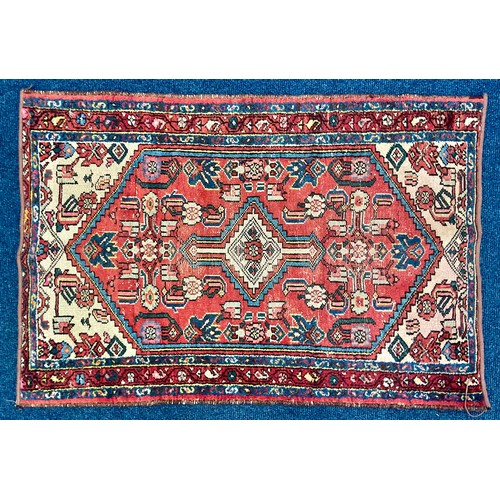 812 - RED GROUND PRAYER RUG, APPROX. 112 X 77 cm