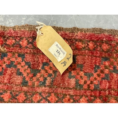 800 - RED GROUND AFGHAN BASHIR CARPET WITH BONHAMS LOT NUMBER, APPROX. 295 X 248 cm