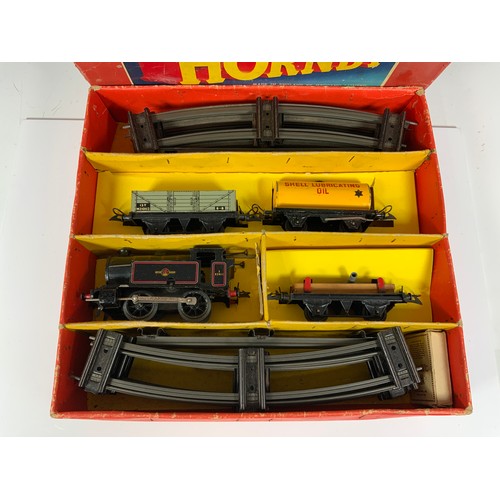 403 - HORNBY 0 GAUGE TANK GOODS SET NO 40, IN LATER RED BOX, COMPRISING 0-4-0 TANK 82011, 3 WAGONS & QTY O... 