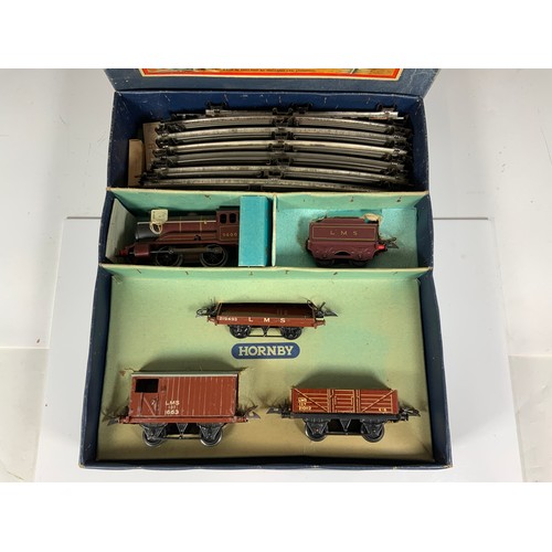 406 - HORNBY 0 GAUGE, BOXED 601 GOODS TRAIN SET, WITH LMS 0-4-0 TENDER LOCOMOTIVE, 5600 WITH TESTER M43 TA... 