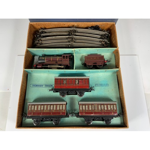 407 - HORNBY 0 GAUGE BOXED NO 501 PASSENGER SET LMS, LOCO 5600, AND 3 X 4 WHEEL COACHES AND TRACK AS SHOWN